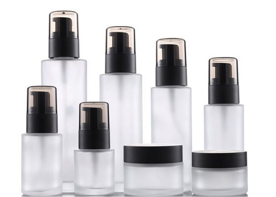 Botella de loción de cosmética de perfume helada vacía y vidrio de crema transparente con tapa de billa de pato