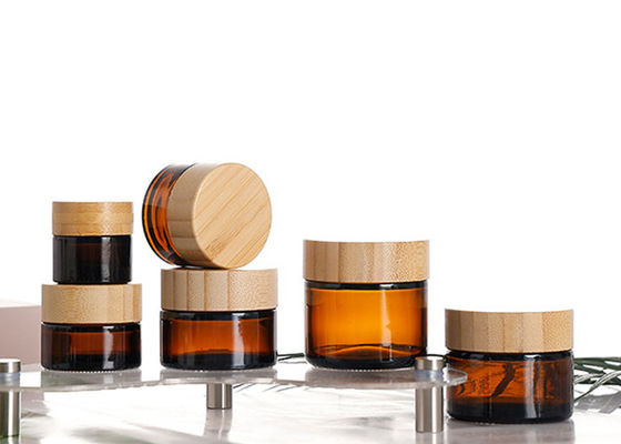 10g 30g 50g 100g Cosméticos Jarrones de vidrio de tapa de bambú 50g Crema facial Jarrón de vidrio de ámbar con tapa de bambú